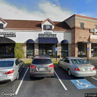 Thumbnail image of the front of a dentist office practice with the name The Smile Design which is located in Alpharetta, GA