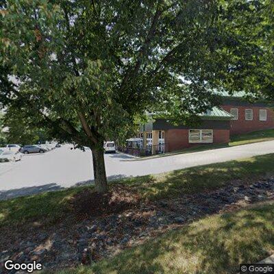 Thumbnail image of the front of a dentist office practice with the name Evenly Orthodontics which is located in Clarksburg, MD