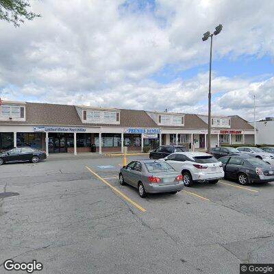 Thumbnail image of the front of a dentist office practice with the name Premier Dental which is located in Lowell, MA