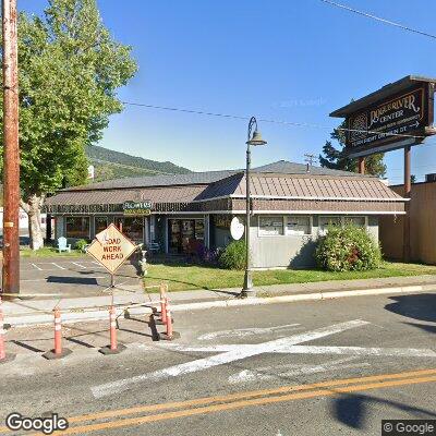 Thumbnail image of the front of a dentist office practice with the name Denture Care which is located in Rogue River, OR