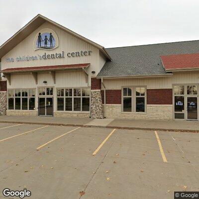 Thumbnail image of the front of a dentist office practice with the name The Children's Dental Center which is located in Coralville, IA