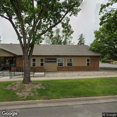 Thumbnail image of the front of a dentist office practice with the name Caring Smiles which is located in Fort Collins, CO