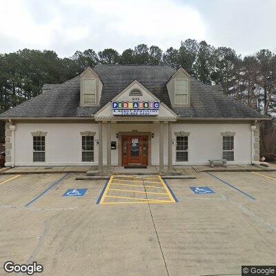 Thumbnail image of the front of a dentist office practice with the name Neighborhood Pediatric & Adult Dentistry which is located in Stone Mountain, GA