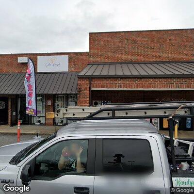 Thumbnail image of the front of a dentist office practice with the name Dr. Hariklia Tzioros, DDS which is located in Charlotte, NC