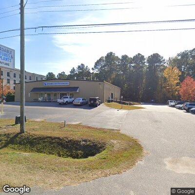 Thumbnail image of the front of a dentist office practice with the name Affordable Dentures & Implants which is located in Rockingham, NC