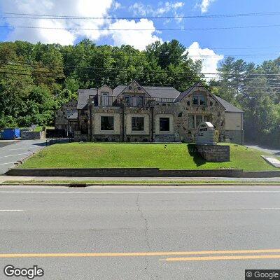 Thumbnail image of the front of a dentist office practice with the name The Extra Smile which is located in Boone, NC