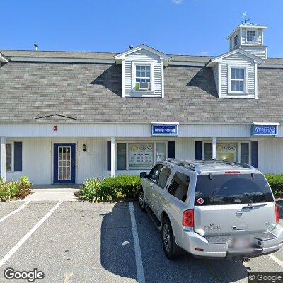 Thumbnail image of the front of a dentist office practice with the name Dracut Dental Group which is located in Dracut, MA