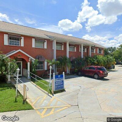 Thumbnail image of the front of a dentist office practice with the name Happy Smiles which is located in Clearwater, FL