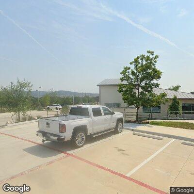 Thumbnail image of the front of a dentist office practice with the name Gallagher Orthodontics which is located in Spicewood, TX