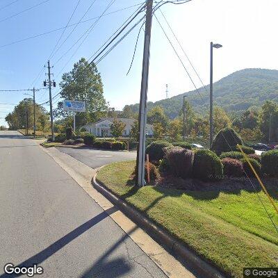 Thumbnail image of the front of a dentist office practice with the name Affordable Dentures & Implants which is located in Asheville, NC