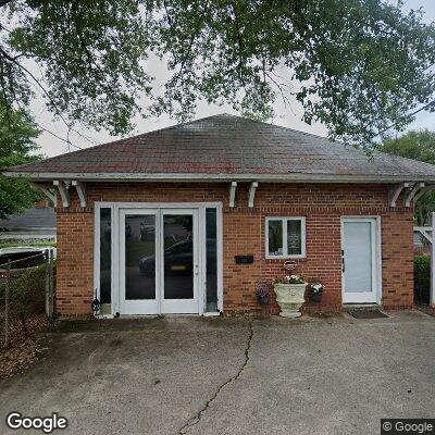 Thumbnail image of the front of a dentist office practice with the name Hollywood Smiles Denture Center which is located in Forsyth, GA