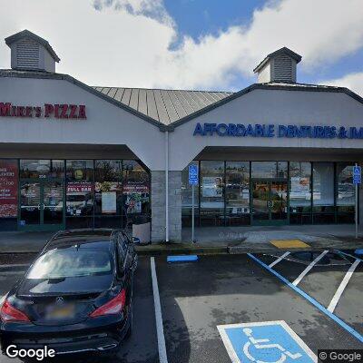 Thumbnail image of the front of a dentist office practice with the name Affordable Dentures & Implants which is located in Windsor, CA