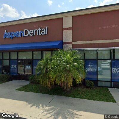 Thumbnail image of the front of a dentist office practice with the name Aspen Dental which is located in Orlando, FL