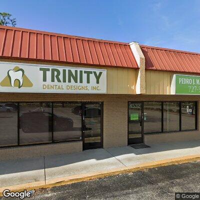 Thumbnail image of the front of a dentist office practice with the name Trinity Dental Designs which is located in New Port Richey, FL