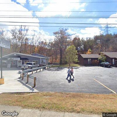 Thumbnail image of the front of a dentist office practice with the name Dr. Kim Arnold Smile Center which is located in Russell, KY