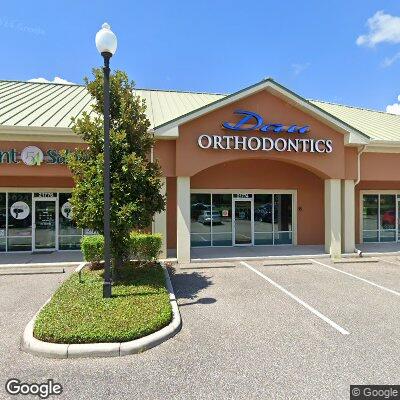 Thumbnail image of the front of a dentist office practice with the name Dau Orthodontics which is located in Lutz, FL