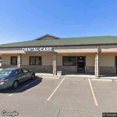 Thumbnail image of the front of a dentist office practice with the name Pearly Whites Dental Care which is located in Kansas City, KS