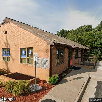 Thumbnail image of the front of a dentist office practice with the name Momentum Dental which is located in Woodbridge, VA