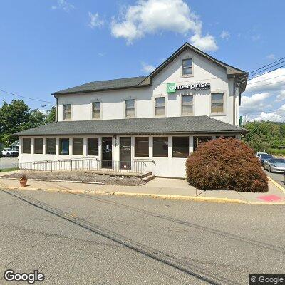 Thumbnail image of the front of a dentist office practice with the name Evenly Orthodontics which is located in Oakland, NJ