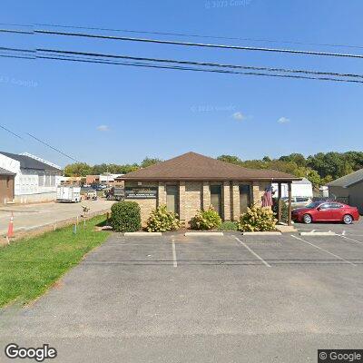 Thumbnail image of the front of a dentist office practice with the name Panhandle Periodontics which is located in Martinsburg, WV