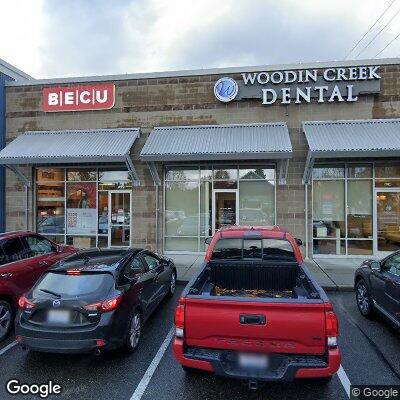 Thumbnail image of the front of a dentist office practice with the name Woodin Creek Dental which is located in Woodinville, WA