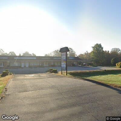 Thumbnail image of the front of a dentist office practice with the name Dental Care which is located in Bethany, CT