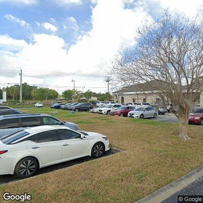 Thumbnail image of the front of a dentist office practice with the name Dental Care Alliance which is located in Rockledge, FL