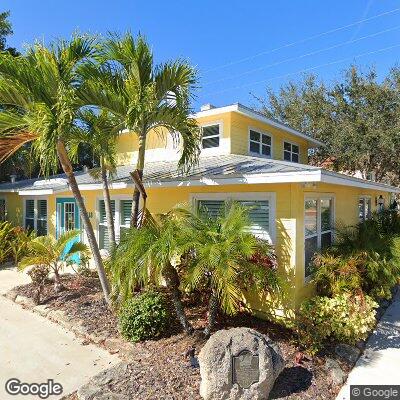 Thumbnail image of the front of a dentist office practice with the name Tropical Smiles which is located in Melbourne, FL