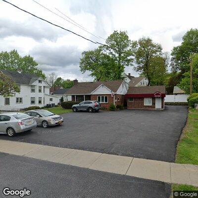 Thumbnail image of the front of a dentist office practice with the name Lambach Dental Studios which is located in Central Valley, NY