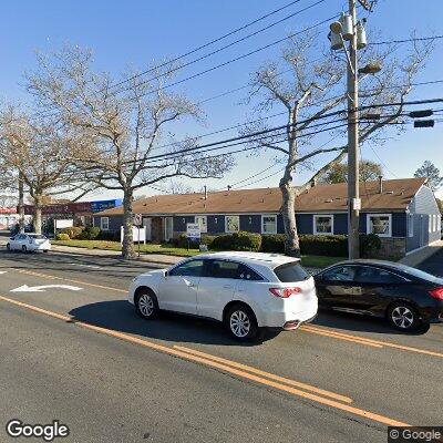 Thumbnail image of the front of a dentist office practice with the name Eugene Pezzollo DMD and Rodney Rastegar DDS P which is located in Oceanside, NY