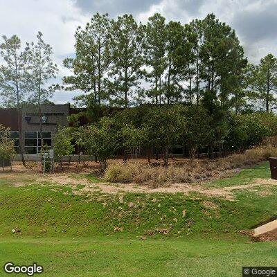 Thumbnail image of the front of a dentist office practice with the name Hanigan and Johnson Orthodontics which is located in Montgomery, TX