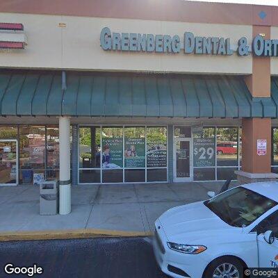 Thumbnail image of the front of a dentist office practice with the name Greenberg Dental & Orthodontic which is located in Holiday, FL