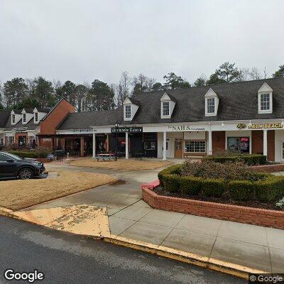 Thumbnail image of the front of a dentist office practice with the name Village Orthodontics which is located in Dunwoody, GA