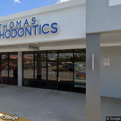 Thumbnail image of the front of a dentist office practice with the name Thomas Orthodontics which is located in Land O' Lakes, FL