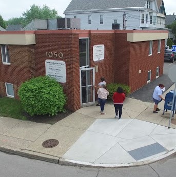 Thumbnail image of the front of a dentist office practice with the name Suburban Dental which is located in Buffalo, NY