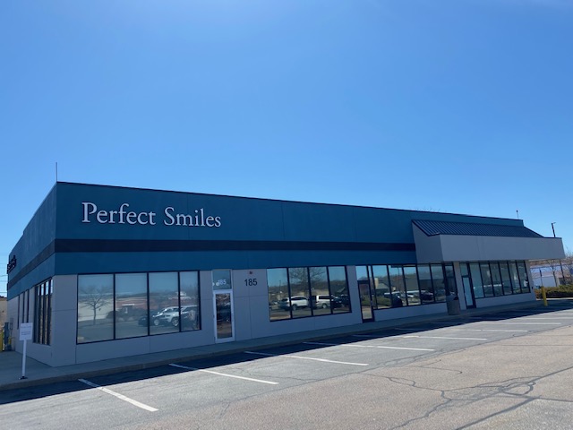 Thumbnail image of the front of a dentist office practice with the name Perfect Smiles Dentistry which is located in Seekonk, MA