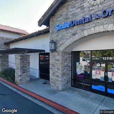 Thumbnail image of the front of a dentist office practice with the name Nieva R. Bautista DMD which is located in Vista, CA