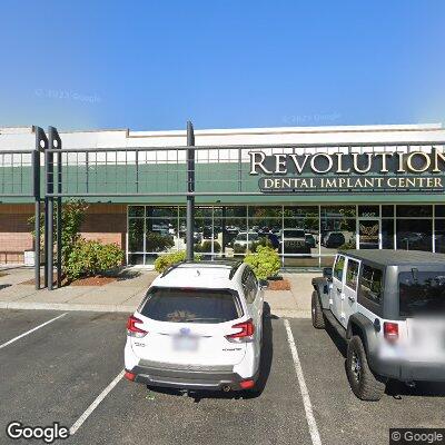 Thumbnail image of the front of a dentist office practice with the name Revolution Dental Implant Center which is located in Oregon City, WA