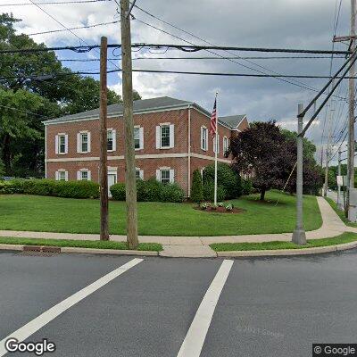 Thumbnail image of the front of a dentist office practice with the name Smile Care Dental Group which is located in Paramus, NJ