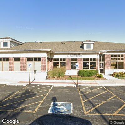 Thumbnail image of the front of a dentist office practice with the name Living Well Dental Group which is located in Naperville, IL