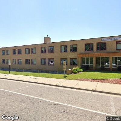 Thumbnail image of the front of a dentist office practice with the name Caring Hands Dental Clinic which is located in Alexandria, MN