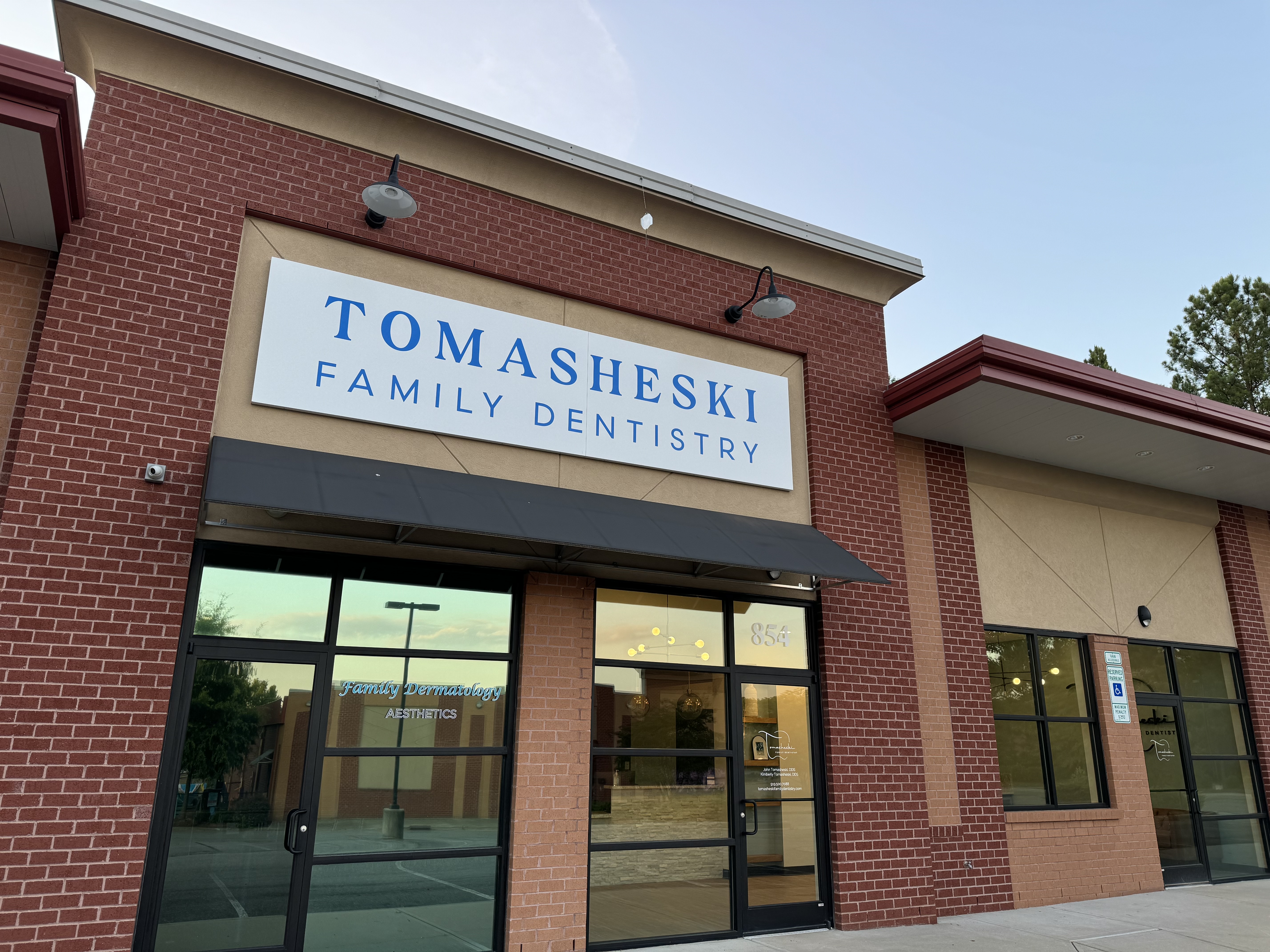 Thumbnail image of the front of a dentist office practice with the name Tomasheski Family Dentistry  which is located in Apex, NC