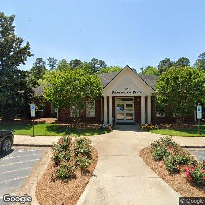 Thumbnail image of the front of a dentist office practice with the name McClure Orthodontics which is located in Cary, NC