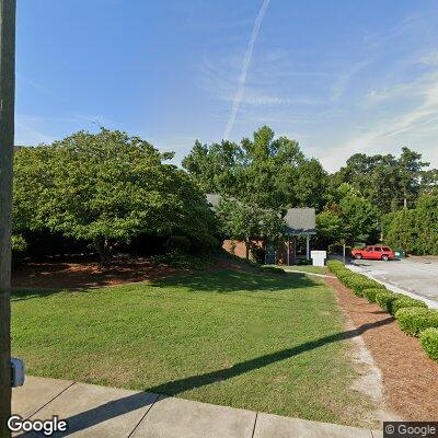 Thumbnail image of the front of a dentist office practice with the name Axiom Dentistry which is located in Clayton, NC