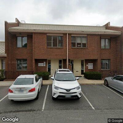 Thumbnail image of the front of a dentist office practice with the name Gene Y Woo DDS PC which is located in Falls Church, VA