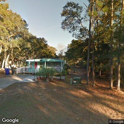 Thumbnail image of the front of a dentist office practice with the name Carolinas Oral & Facial Surgery Center which is located in Oak Island, NC