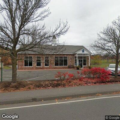 Thumbnail image of the front of a dentist office practice with the name Triangle Family Dental which is located in Amherst, MA