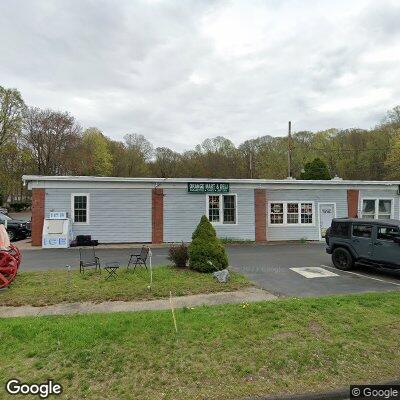 Thumbnail image of the front of a dentist office practice with the name Orange Center Dentistry which is located in Orange, CT