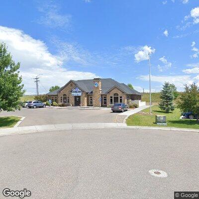 Thumbnail image of the front of a dentist office practice with the name Green Apple Dental which is located in Rexburg, ID