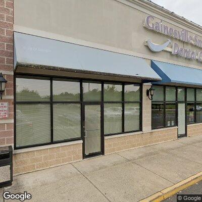 Thumbnail image of the front of a dentist office practice with the name Neibauer Dental Care which is located in Gainesville, VA